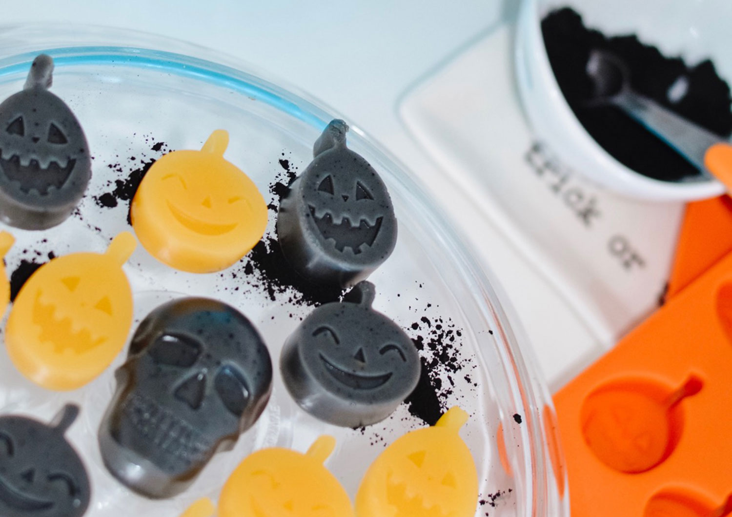 Black and Orange jack-o'-lantern-shaped gummies